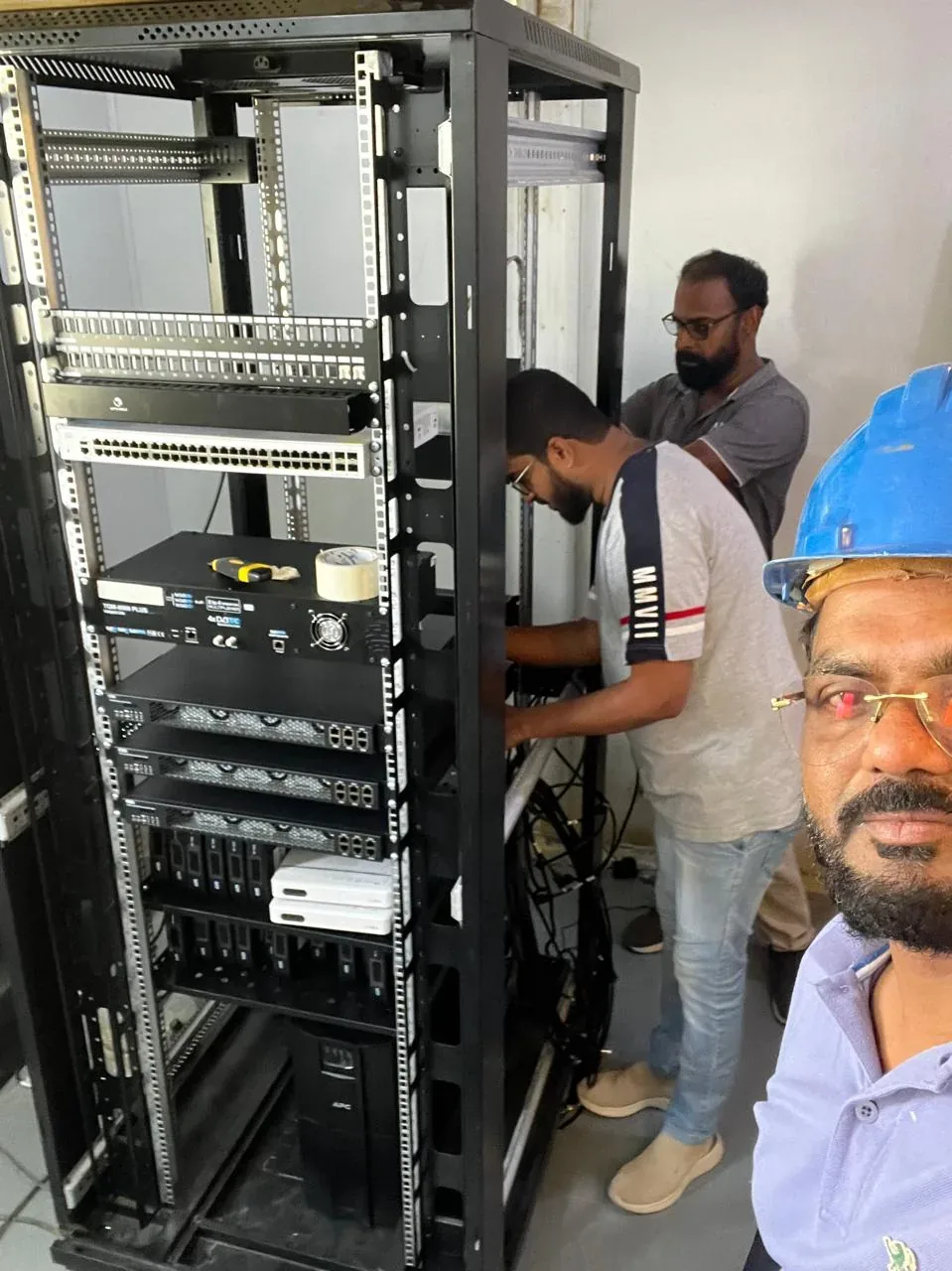 Yanbu hotel, port and staff-housing reference showing iPTV headend and network rack installation for the Saudi labour camp project