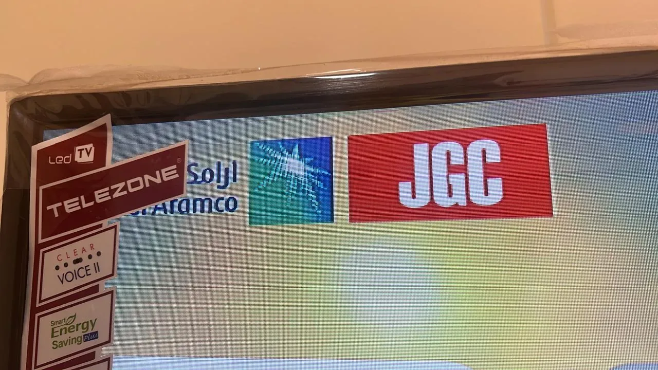 Yanbu hotel, port and staff-housing reference showing iPTV system testing and verification on a Smart TV for the Aramco JGC project