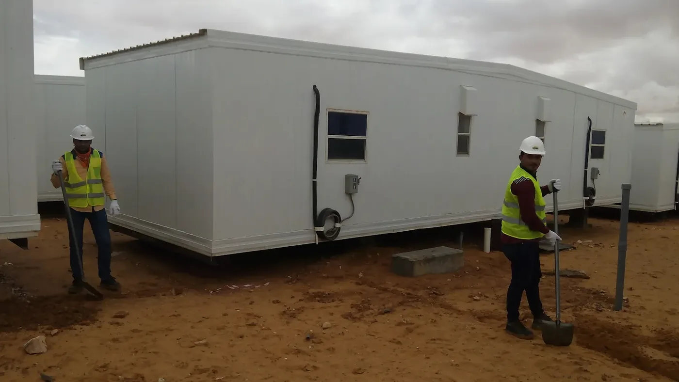 Yanbu hotel, port and staff-housing reference showing labour camp infrastructure work for the Aramco gas and oil project in Turaif