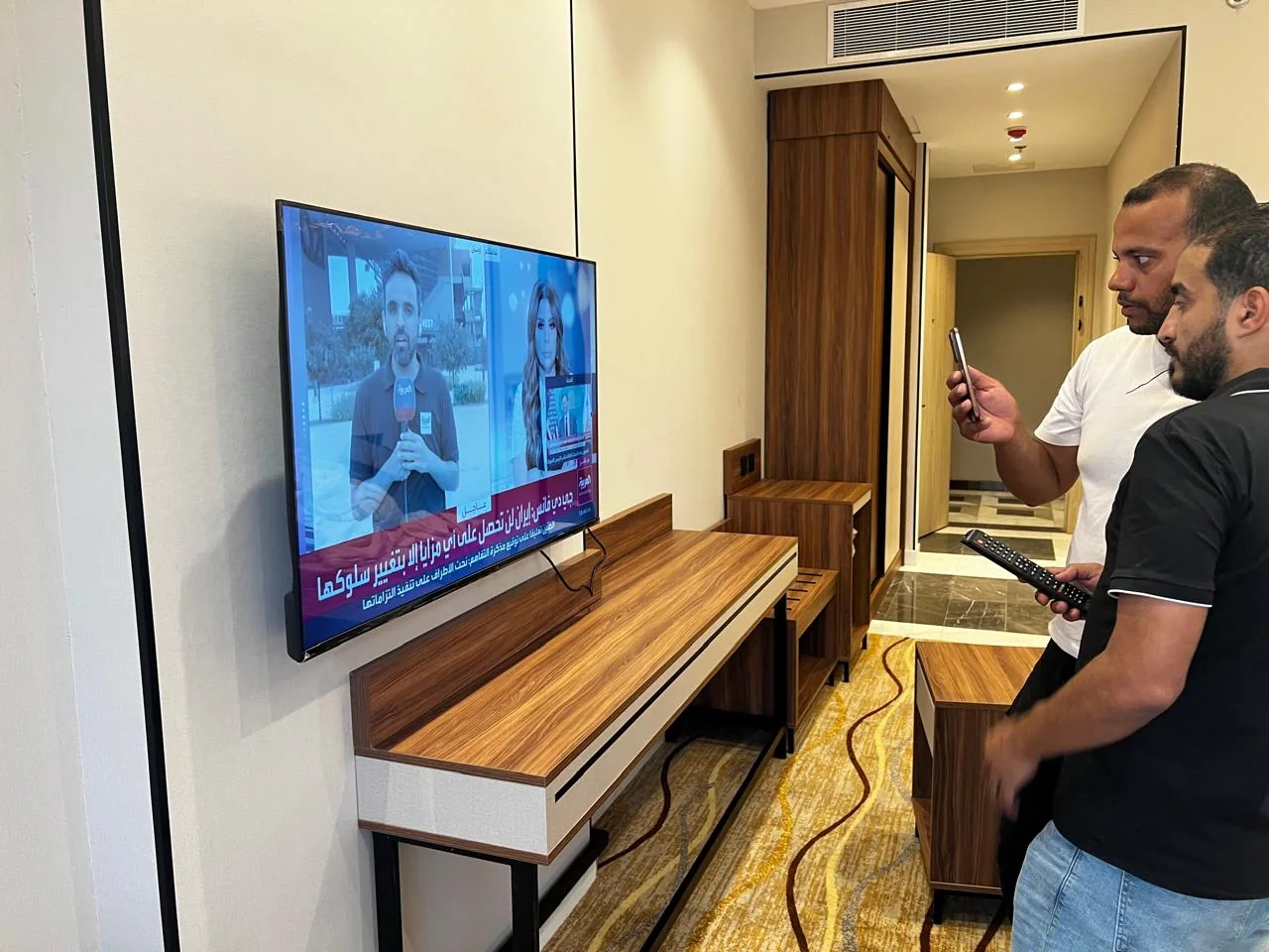 Yanbu hotel, port and staff-housing reference showing live TV System Testing in Guest Room - Al Meaqat Plaza Madinah