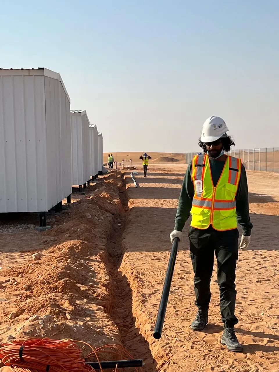 Yanbu hotel, port and staff-housing reference showing structured cabling and conduit installation across the Aramco JGC labour camp facilities near Al Kharj